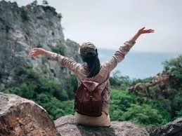 Excited first-time solo traveler starting their adventure.